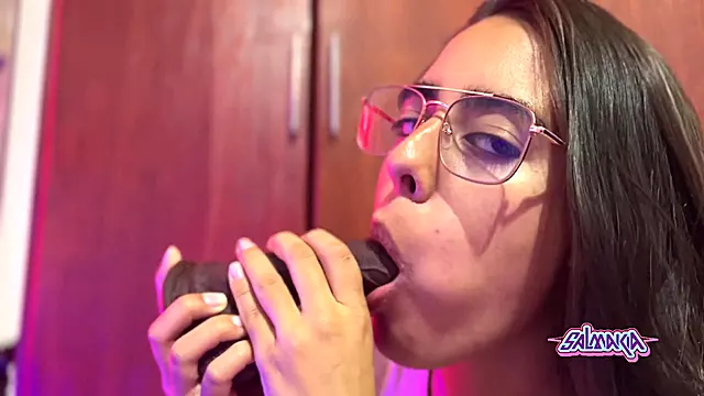 Salmakia sucks and licks a good black dildo- JOI