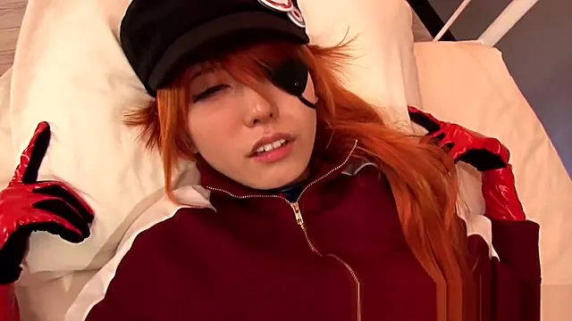 Asian cosplay teen 18 in rubber showing creampie