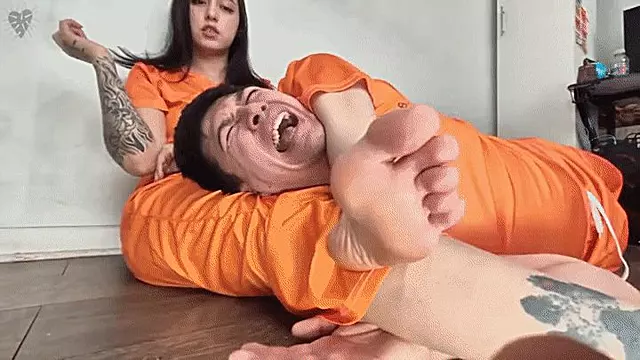 Sexy Prisoner girl Wrestling and Foot dominate a new male prisoner