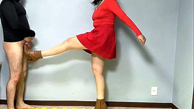 650 Red Domme Kicks Hard: Amateur Ballbusting with Brown Boots