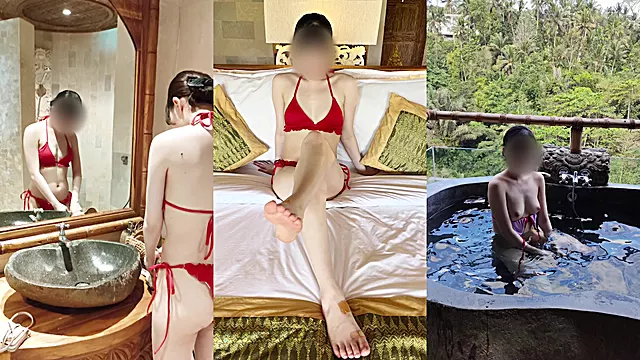 Japanese slender with red bikini in the open-air bath on the balcony