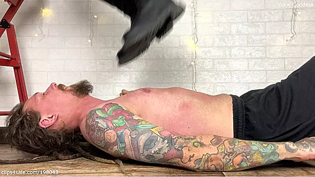 Hard and careless trampling, jumping and kicking with flats and platform knee boots