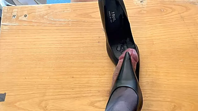 Shoejob over cockbox with long pointed heels and cum inside shoe before wear it
