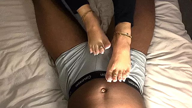 Chrome french tips footjob view from above