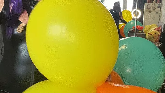 womancat b2p balloons and blue gloves