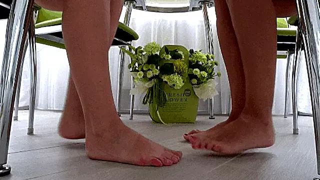 Barefoot fight under the table a