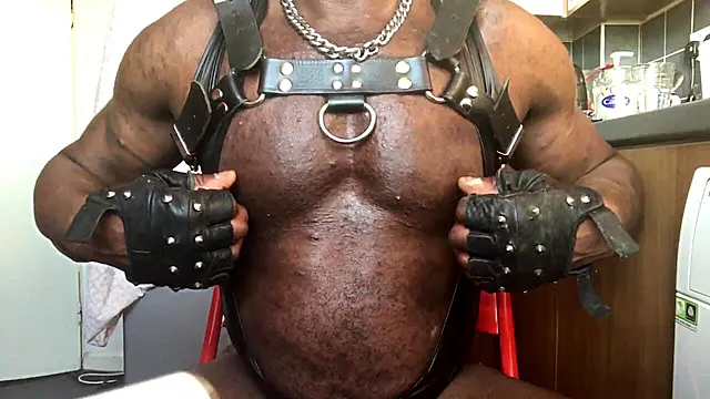 Black Mature Muscle Leather Harness Latex Singlet Tit Play