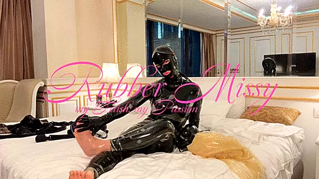 Rubbermissy double latex layer gagged as Rubberdoll and fucked from behind by gasmasked dom