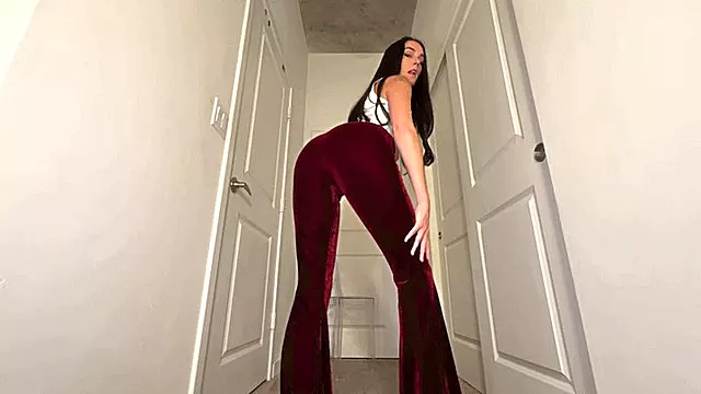 Velvet Pants Addict JOIThese crimson velvet pants hug my long legs so perfectly. You imagine how it would feel to rub your throbbing cock up against the soft material.