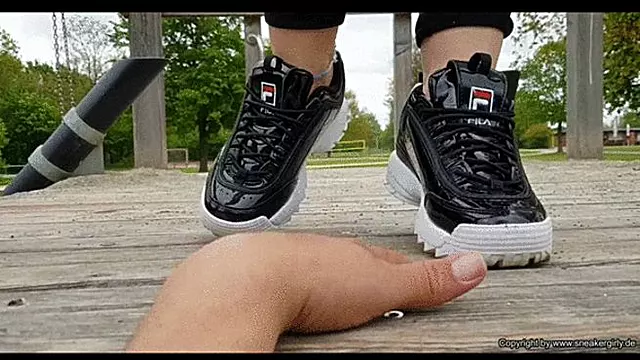 hand trample in cute new Fila sneakers