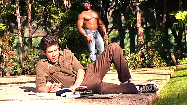 Buff black stud gets head and buries his cock deep inside guys tight ass