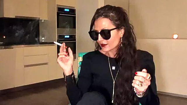 Smoking Sultana and two competing ashtrays copy