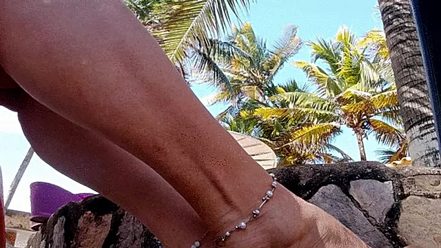 Magnificent feet with pronounced arches modeled on a beach (1)