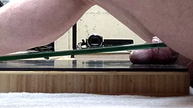 FULL WEIGHT COCK CRUSH IN WEDGED BOOTS ON THE FLOOR BOARD UNDER GLASS RUINED ORGASM CAM 3 PT1