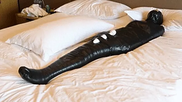 GG36 - A girl wrapped in duct tape reaches orgasm using a vibrator.